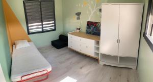 Villas Villa climatisee piscine aire de jeux : photos des chambres