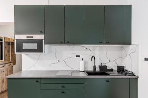 Apartmaji Gašperčič, NEJC