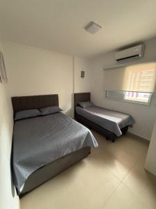 Apto no canto do forte 3 min da praia