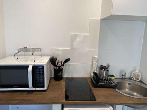 Appartements Eclat faubourg I Climatisation I Proche gare I Parking : photos des chambres