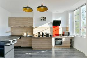 Appartements Spacieux Centre-ville Balcon : photos des chambres