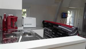 Appartement tout confort dans petit jardin calme