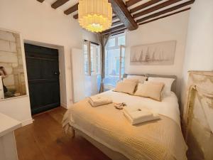 Appartements Coeur de Caen, charme ancien & confort moderne : photos des chambres