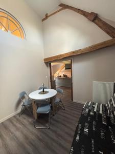 Appartements Le magnolia : photos des chambres