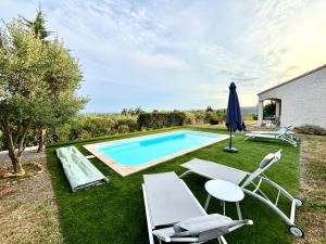 Maisons de vacances Maison avec piscine et jolie vue : photos des chambres