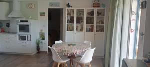 T2 350m mer rez de jardin terrasse parking privé