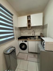 Appartements Un joli studio avec terrasse : photos des chambres