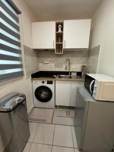 Appartements Un joli studio avec terrasse : photos des chambres