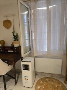 Appartements Studio Arenes Congres EcoFriendly Centre : photos des chambres