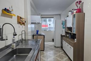 Acesso à Praia e Surf Melhor localização