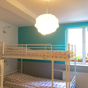 Single Bed in Dormitory Room (6 Adults) with Shared BathRoom