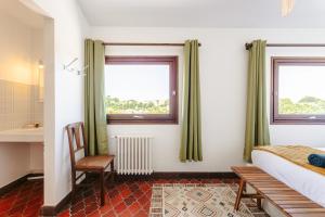Maisons de vacances Les Arenes - Grande maison familiale renovee, 6 a 12 personnes , Vue sur les Arenes, Garage vehicule electrique, Parking Gratuit : photos des chambres