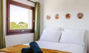 Maisons de vacances Les Arenes - Grande maison familiale renovee, 6 a 12 personnes , Vue sur les Arenes, Garage vehicule electrique, Parking Gratuit : photos des chambres
