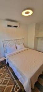 Frisch renovierte klimatisierte Ferienwohnung - nur 100 m vom Strand entfernt