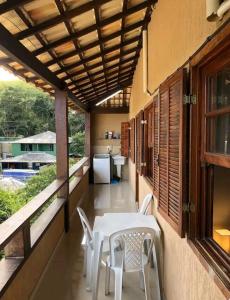 Casa com cobertura de vista para o mar