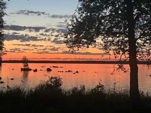 Traditional Finnish lakeside off-grid cabin