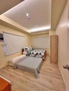 Relax in Style WalkCity, Roxas Market with Pool