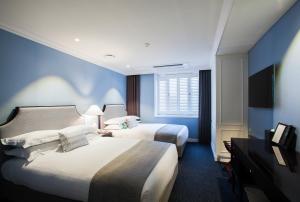 Phòng Hai Giường Đơn Gia Đình – Không Gồm Chỗ Đỗ Xe (Family Twin Room - No Parking Included)