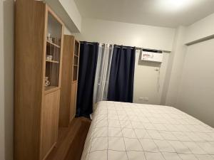 Modern 2BR Condo with Balcony in Central Manila