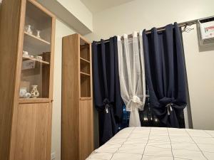 Modern 2BR Condo with Balcony in Central Manila