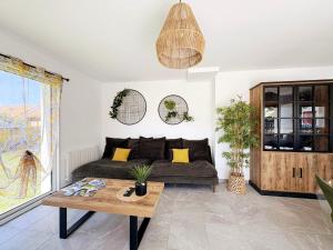 Maisons de vacances Les Rochers - Raffinement boise & Plage a 5 min en voiture - Serenite : photos des chambres