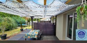 B&B / Chambres d'hotes EntreLac&Ocean3 - entree et terrasse privee : Chambre Double - Vue sur Jardin