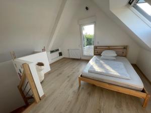 Maisons de vacances Maisons neuves dans quartier calme : photos des chambres