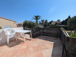 Villas Maison St Cyprien village au calme, clim et jardin : photos des chambres