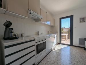 Villas Maison St Cyprien village au calme, clim et jardin : photos des chambres