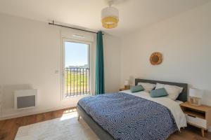 Appartements Ambiance Mer - Avec terrasse : photos des chambres