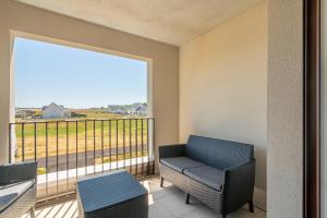 Appartements Ambiance Mer - Avec terrasse : photos des chambres