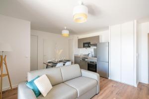 Appartements Ambiance Mer - Avec terrasse : photos des chambres