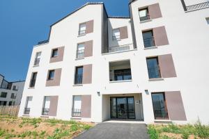 Appartements Ambiance Mer - Avec terrasse : photos des chambres