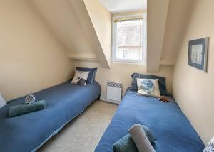 Maisons de vacances Maison cosy a 2 pas du port et de la plage : photos des chambres