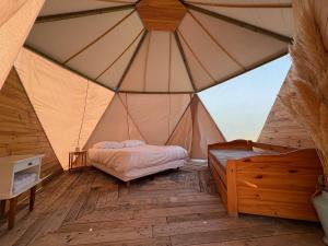 Tentes de luxe Les Cabanes du Vigne : photos des chambres