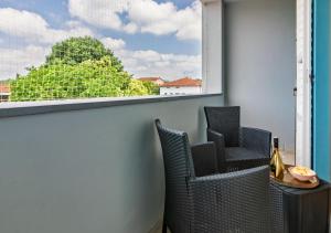 Appartamento Moderno - Terrazza e Parcheggio Coperto