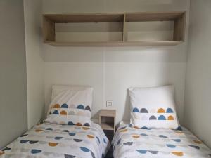 Appartements Mobil-home 4pers avec terrasse : photos des chambres