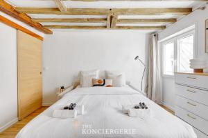 Appartements Nid elegant dans le Marais historique : photos des chambres