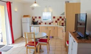 Appartements Le Petit Etang : photos des chambres