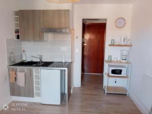 Appartements Studio cosy proche des plages de Golfe Juan : photos des chambres