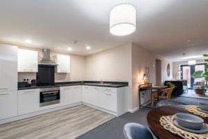 2 bedroom flat by Eccles Station with communal rooftop garden