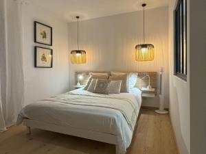 Appartements L-escapage Vintage - Gite - 2 chambres : photos des chambres