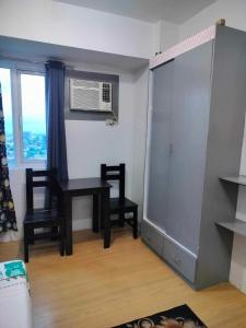 Cozy City View Condo in Quezon City - Your Home Away from Home