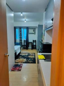 Cozy City View Condo in Quezon City - Your Home Away from Home