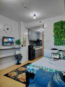 Cozy City View Condo in Quezon City - Your Home Away from Home