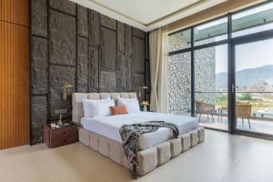 SaffronStays Abhinandan Villa - 4BR Jaipur villa with private pool, bathtubs, gazebo bonfire & lawns facing the Aravallis