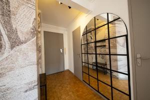 Appartement lumineux avec une grande terrasse et parking au cœur de la ville