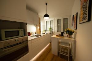 Appartement lumineux avec une grande terrasse et parking au cœur de la ville