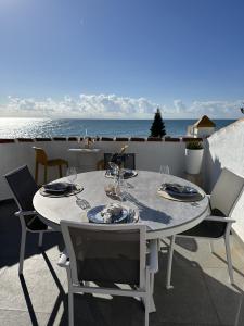 Sea view beachfront penthouse with BBQ