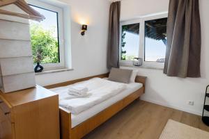 HOIMATglück - Großes Apartment mit 3 Schlafzimmern, überdachtem Balkon & separatem WC in ruhiger Lage